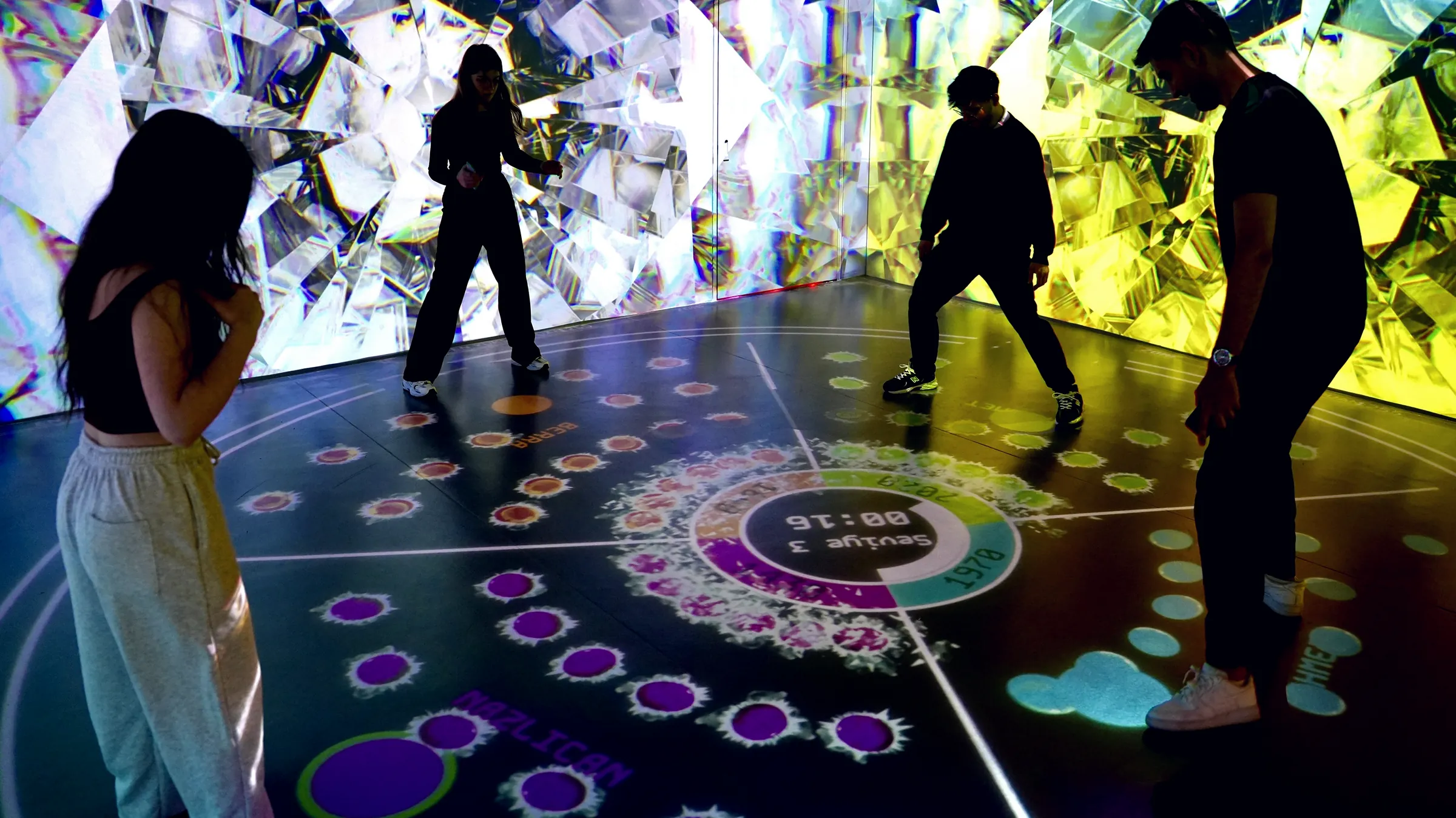 Adults playing together in a mixed-reality room